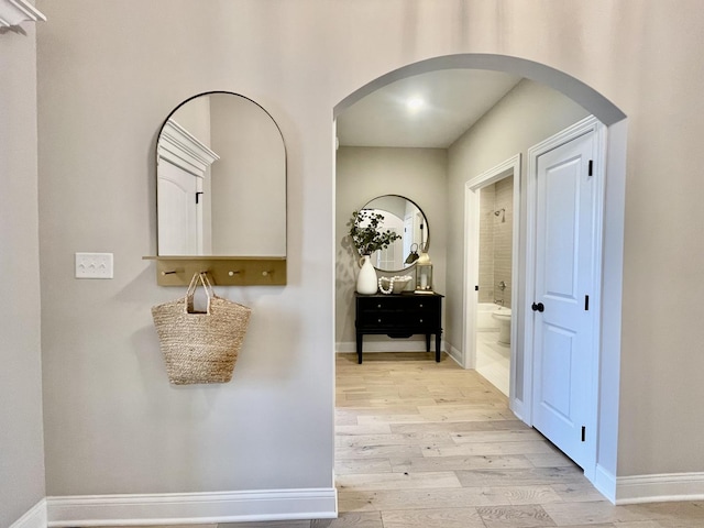 15959 Prairie View Ct Unit T6, New Lenox, IL 60451 - corridor featuring arched walkways, light wood-style floors, and baseboards