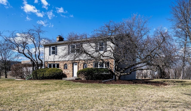 22W046 Mccormick Ave, Glen Ellyn, IL 60137 - colonial home with a chimney, a front lawn, and brick siding