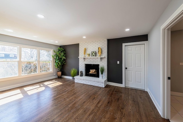 22W046 Mccormick Ave, Glen Ellyn, IL 60137 - unfurnished living room with dark wood-style floors, baseboards, a fireplace, and recessed lighting