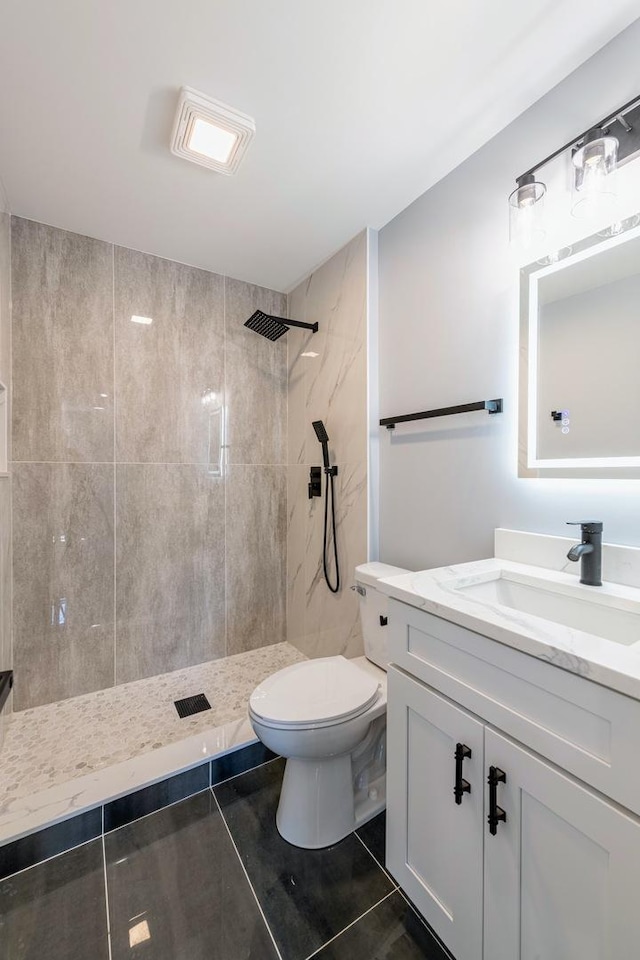 22W046 Mccormick Ave, Glen Ellyn, IL 60137 - full bath with toilet, vanity, and a tile shower