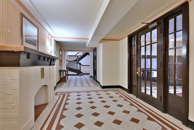 226 N Oak Park Ave Unit 3N, Oak Park, IL 60302 - hall with stairway, inlaid floor details, and baseboards