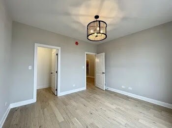 LOTT1015950 Prairie View Ct, New Lenox, IL 60451 - living area with a ceiling fan, light wood-type flooring, plenty of natural light, a stone fireplace, and recessed lighting