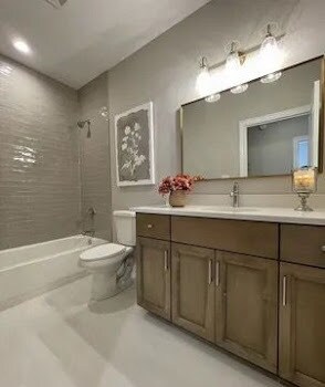 LOTT1015950 Prairie View Ct, New Lenox, IL 60451 - kitchen with wall chimney exhaust hood, stainless steel appliances, backsplash, light wood finished floors, and white cabinetry
