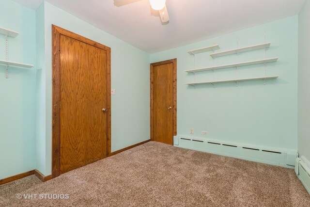 8747 Merrimac Ave, Oak Lawn, IL 60453 - unfurnished bedroom with carpet floors, baseboard heating, and baseboards