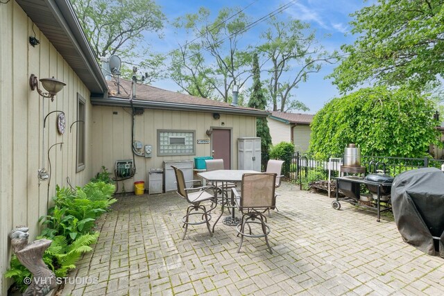8747 Merrimac Ave, Oak Lawn, IL 60453 - view of patio with grilling area and outdoor dining area