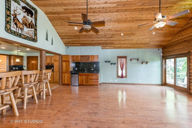 8747 Merrimac Ave, Oak Lawn, IL 60453 - kitchen featuring high vaulted ceiling, brown cabinetry, ceiling fan, wood ceiling, and backsplash