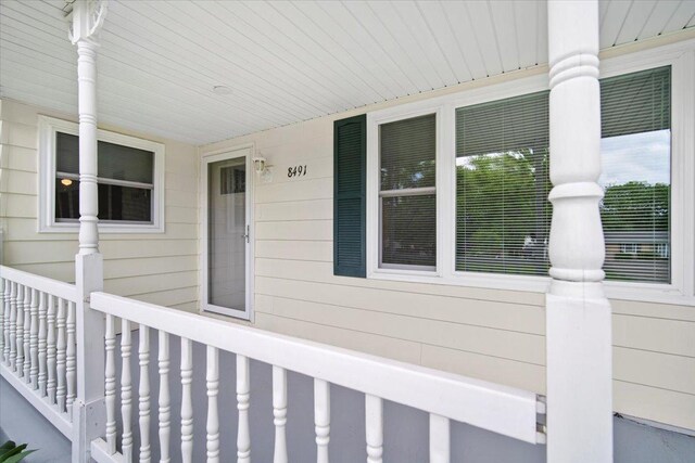 8491 Surrey Cir, Bloomington, IL 61705 - view of home's exterior featuring a porch