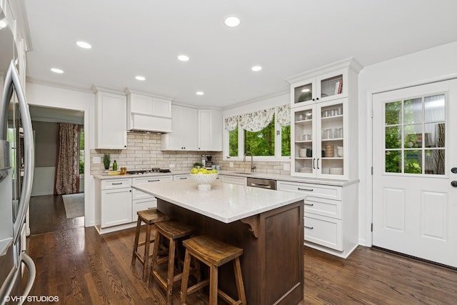 21298 N Andover Rd, Kildeer, IL 60047 - kitchen with dark wood-style floors, a sink, backsplash, white cabinetry, and recessed lighting