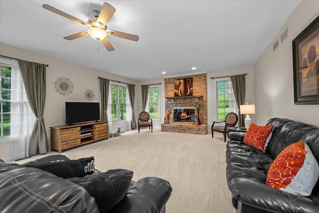 36W703 Whispering Trl, Saint Charles, IL 60175 - carpeted living area with a fireplace, a ceiling fan, and recessed lighting