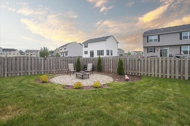 1901 Taos Ln, Volo, IL 60020 - yard at dusk with an outdoor fire pit, a residential view, and a patio area