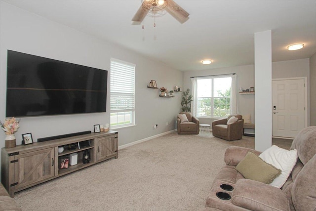 1901 Taos Ln, Volo, IL 60020 - carpeted living room with ceiling fan, plenty of natural light, and baseboards