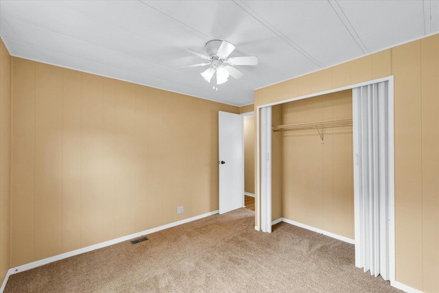 116 Seminole Ln, Loda, IL 60948 - unfurnished bedroom with carpet flooring, a closet, and a ceiling fan