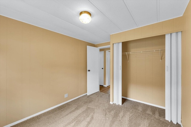 116 Seminole Ln, Loda, IL 60948 - unfurnished bedroom featuring carpet, a closet, and baseboards