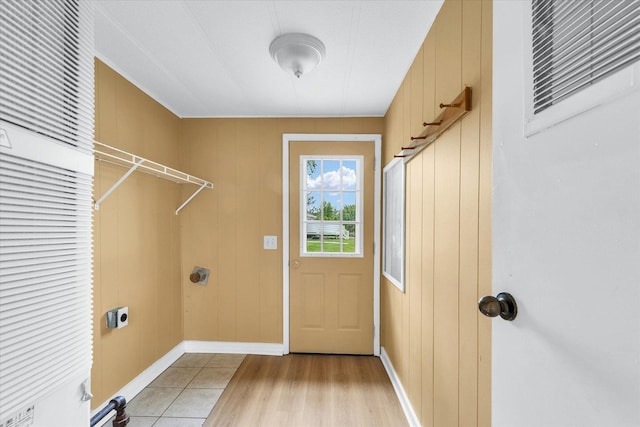116 Seminole Ln, Loda, IL 60948 - washroom featuring electric dryer hookup, light wood-type flooring, and baseboards