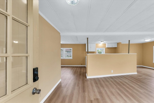 116 Seminole Ln, Loda, IL 60948 - unfurnished living room featuring wood finished floors, baseboards, and ornamental molding