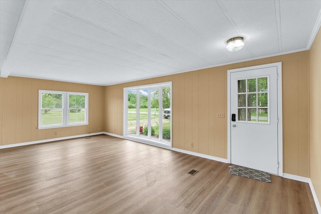 116 Seminole Ln, Loda, IL 60948 - unfurnished room featuring wood finished floors, baseboards, and a textured ceiling