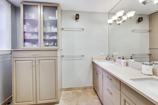 460 W Deming Pl Unit 1E, Chicago, IL 60614 - full bath featuring double vanity and baseboards