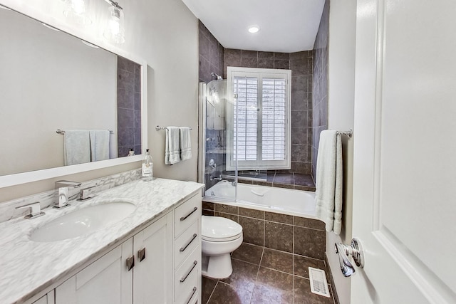 460 W Deming Pl Unit 1E, Chicago, IL 60614 - full bath with tile patterned flooring, tiled shower / bath combo, toilet, and vanity