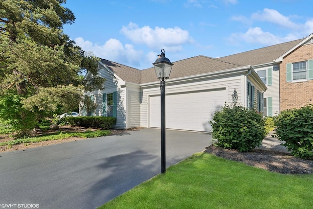 867 Downing Sq, Lincolnshire, IL 60069 - view of front of house featuring concrete driveway and a garage