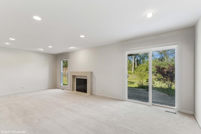 867 Downing Sq, Lincolnshire, IL 60069 - unfurnished living room featuring light carpet, baseboards, recessed lighting, and a high end fireplace