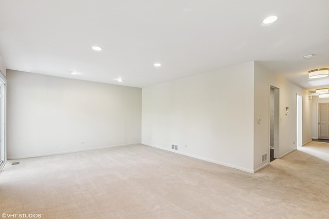 867 Downing Sq, Lincolnshire, IL 60069 - spare room featuring light colored carpet, recessed lighting, and baseboards