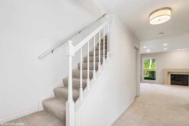 867 Downing Sq, Lincolnshire, IL 60069 - stairway with carpet, baseboards, a high end fireplace, and recessed lighting