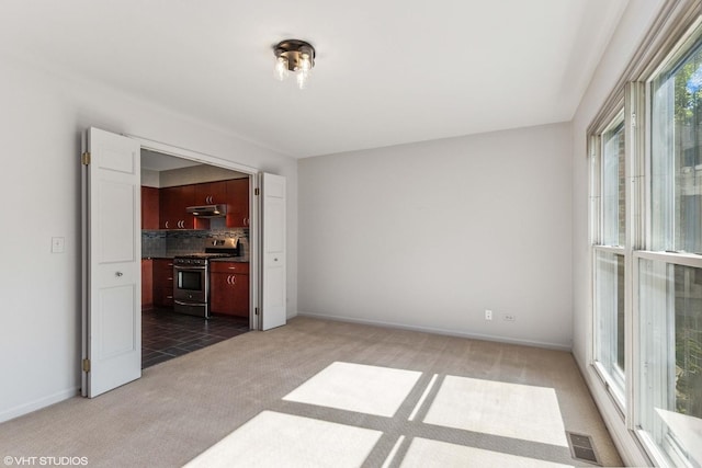 867 Downing Sq, Lincolnshire, IL 60069 - carpeted spare room featuring baseboards