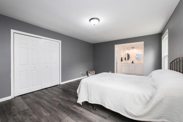 133 W King George Ct, Palatine, IL 60067 - bedroom with dark wood-type flooring, baseboards, a closet, and ensuite bathroom