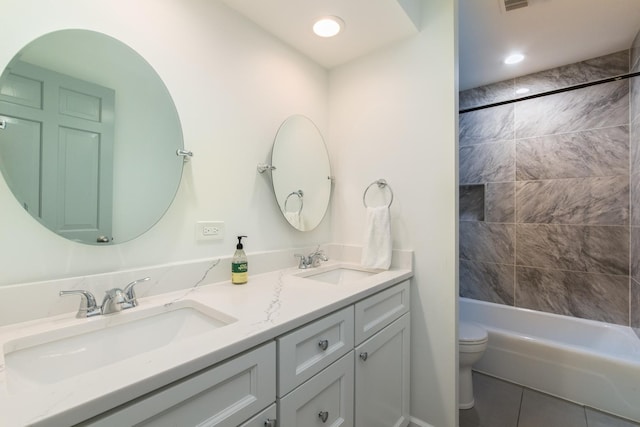 133 W King George Ct, Palatine, IL 60067 - bathroom featuring toilet, double vanity, tile patterned flooring, and bathtub / shower combination