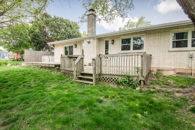 133 W King George Ct, Palatine, IL 60067 - back of house featuring a chimney, brick siding, a lawn, and a deck