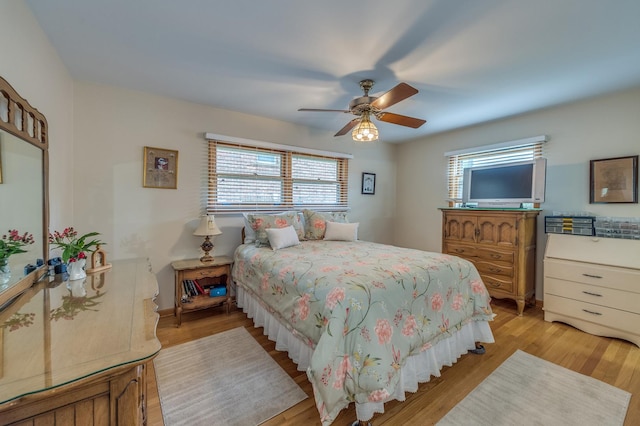 365 S Elm St, Itasca, IL 60143 - bedroom with light wood-style floors and a ceiling fan
