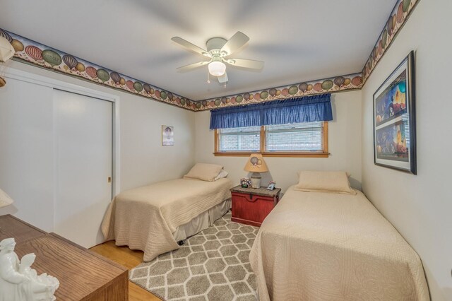 365 S Elm St, Itasca, IL 60143 - bedroom with a closet, a ceiling fan, and wood finished floors