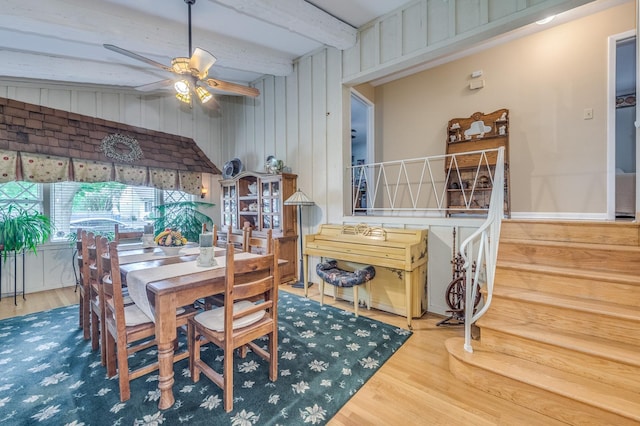 365 S Elm St, Itasca, IL 60143 - dining room with wood finished floors, beamed ceiling, a ceiling fan, and wooden walls