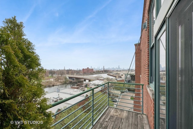 2222 W Diversey Ave Unit 407, Chicago, IL 60647 - balcony featuring a water view and a city view