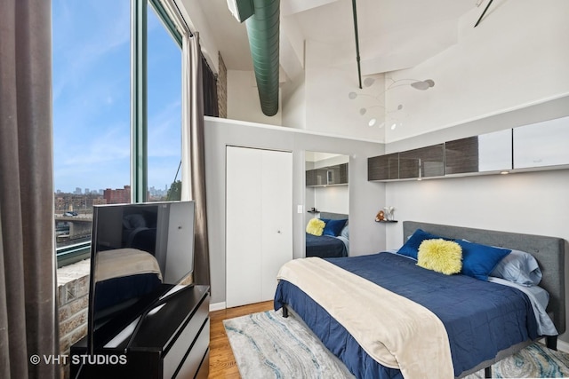 2222 W Diversey Ave Unit 407, Chicago, IL 60647 - bedroom featuring wood finished floors