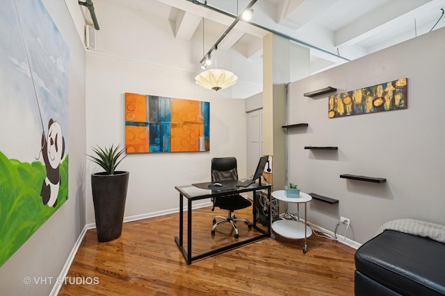2222 W Diversey Ave Unit 407, Chicago, IL 60647 - office with wood finished floors, baseboards, rail lighting, and beam ceiling