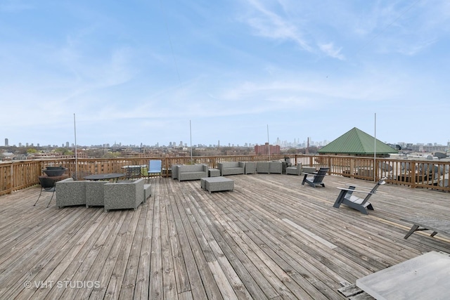 2222 W Diversey Ave Unit 407, Chicago, IL 60647 - wooden deck featuring an outdoor hangout area