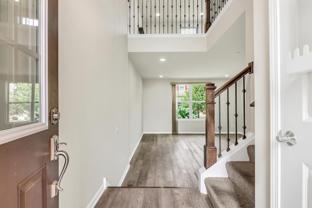 415 Highcroft Way, Lincolnshire, IL 60069 - entrance foyer with stairs, wood finished floors, baseboards, and a high ceiling