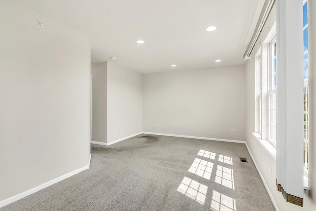 415 Highcroft Way, Lincolnshire, IL 60069 - spare room with carpet, baseboards, recessed lighting, and plenty of natural light