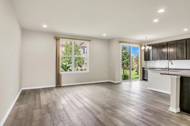 415 Highcroft Way, Lincolnshire, IL 60069 - kitchen featuring a chandelier, recessed lighting, wood finished floors, pendant lighting, and baseboards