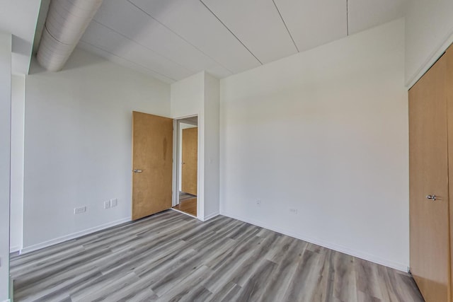 1430 S Michigan Ave Unit 311, Chicago, IL 60605 - spare room with wood finished floors and baseboards