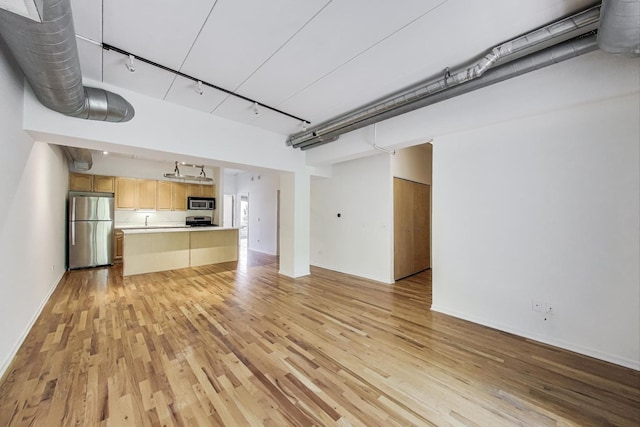 1430 S Michigan Ave Unit 311, Chicago, IL 60605 - unfurnished living room with rail lighting and light wood finished floors