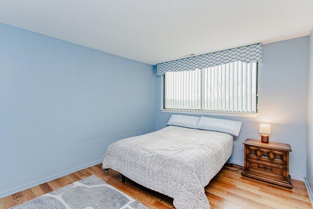 15 Bar Harbour Rd Unit 5A, Schaumburg, IL 60193 - bedroom featuring baseboards and wood finished floors