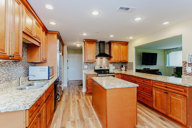 15 Bar Harbour Rd Unit 5A, Schaumburg, IL 60193 - kitchen with wall chimney exhaust hood, stainless steel electric range, a sink, light wood-style floors, and tasteful backsplash
