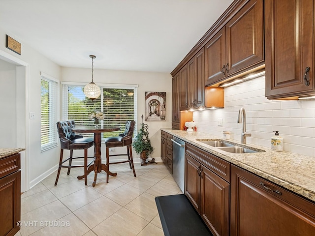 97 Thornhill Ln Unit D, Lake Barrington, IL 60010 - kitchen with stainless steel dishwasher, a sink, baseboards, and tasteful backsplash