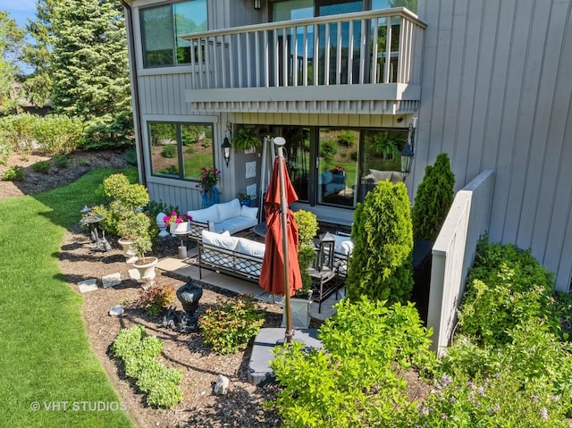 97 Thornhill Ln Unit D, Lake Barrington, IL 60010 - view of exterior entry featuring an outdoor hangout area, a balcony, and a patio area