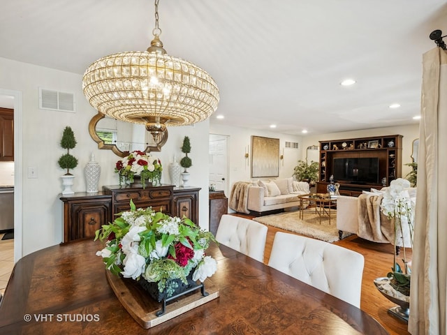 97 Thornhill Ln Unit D, Lake Barrington, IL 60010 - dining room with recessed lighting, a chandelier, and wood finished floors