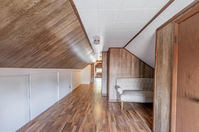 2535 Oak Park Ave, Berwyn, IL 60402 - additional living space with wood finished floors, vaulted ceiling, and wood walls