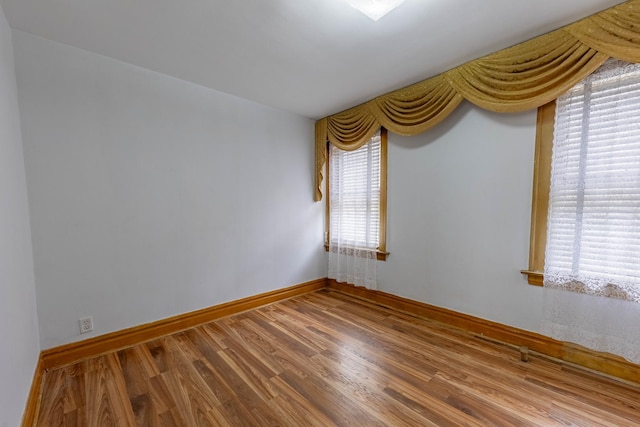 2535 Oak Park Ave, Berwyn, IL 60402 - spare room with wood finished floors and baseboards
