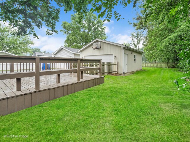 824 Dawes Ave, Wheaton, IL 60189 - view of yard featuring a wooden deck, a garage, and an outbuilding